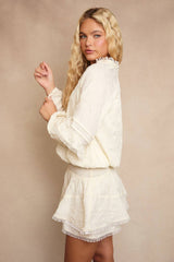 V-NECK WAIST SMOCKED AND RUFFLE DETAIL ROMPER: IVORY / L