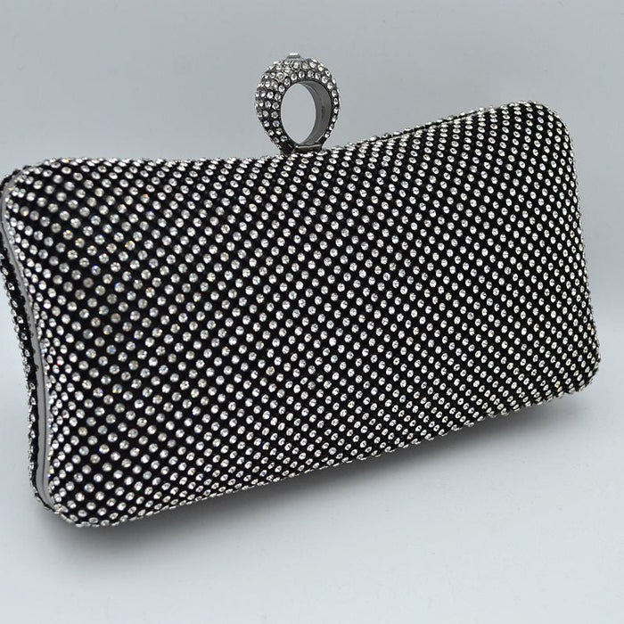Shimmering Studded Clutch Bag with Textured O-Ring Clasp – York Laine