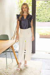 35945 Smock and Ruffle Detail Metallic Woven Top: Navy / S