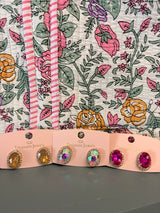 The glow studs in gold, fuchsia, and sugar