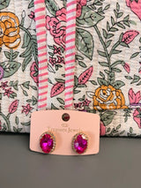 The glow studs in gold, fuchsia, and sugar