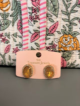 The glow studs in gold, fuchsia, and sugar