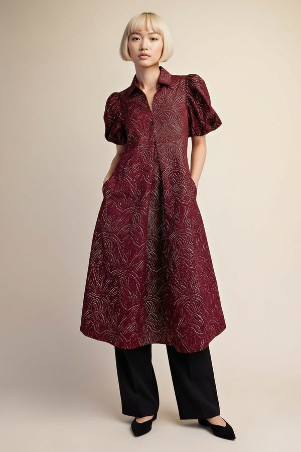 Full body view of the model wearing Puff Sleeve Pleated Lurex Midi Dress