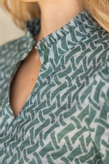35967 Ruffled High Neck Abstract Printed Top: Dark Sage / L