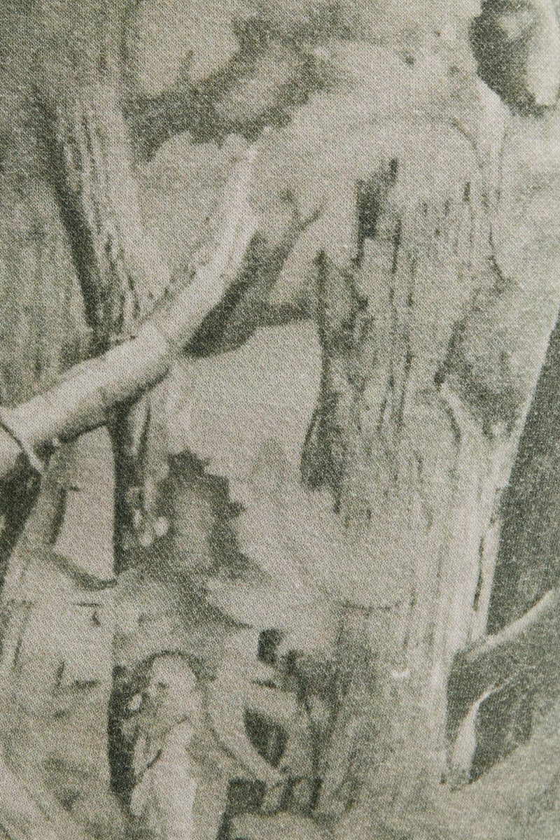 TREE CAMO PRINTED SHORTS INSIDE MINI SKIRT: SAGE CAMO / XS