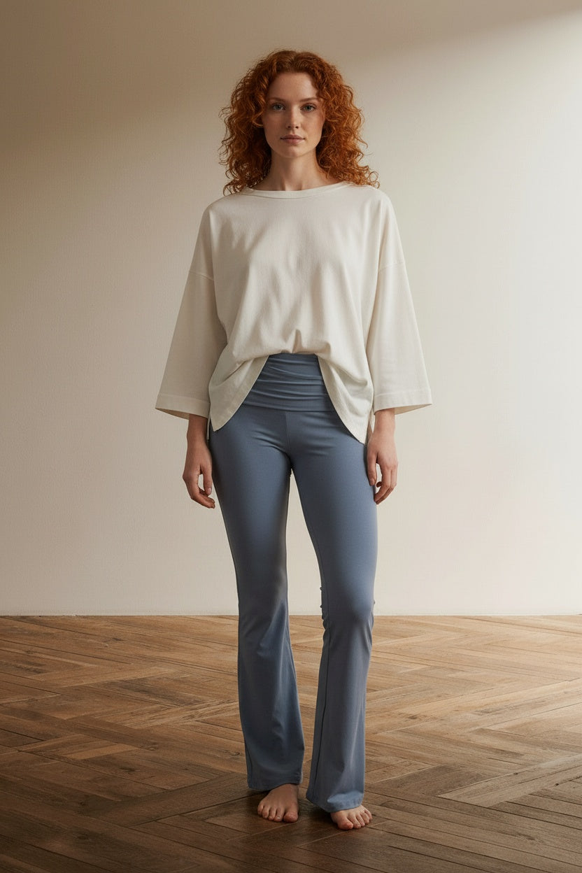 Full body view of the model wearing Soft Knit Fold Over Flare Pants
